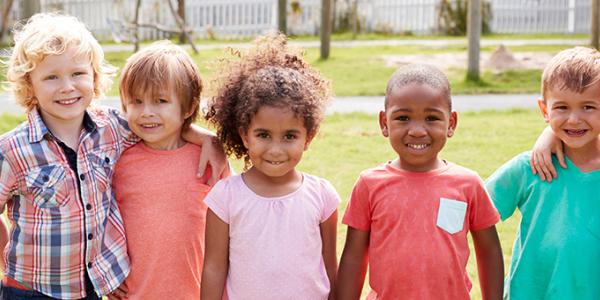 Group of children posing outside